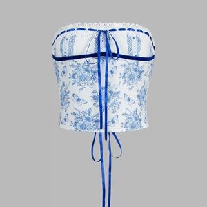 Blue and white floral butterfly bouquet top